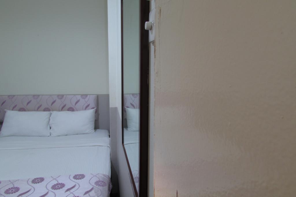 Meriton Hotel Singapur Zimmer foto